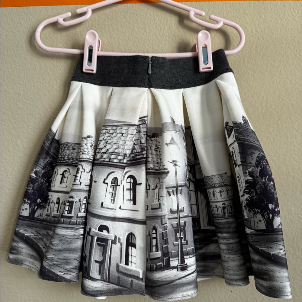 MonnaLisa Black & White Pleated City Print Skirt